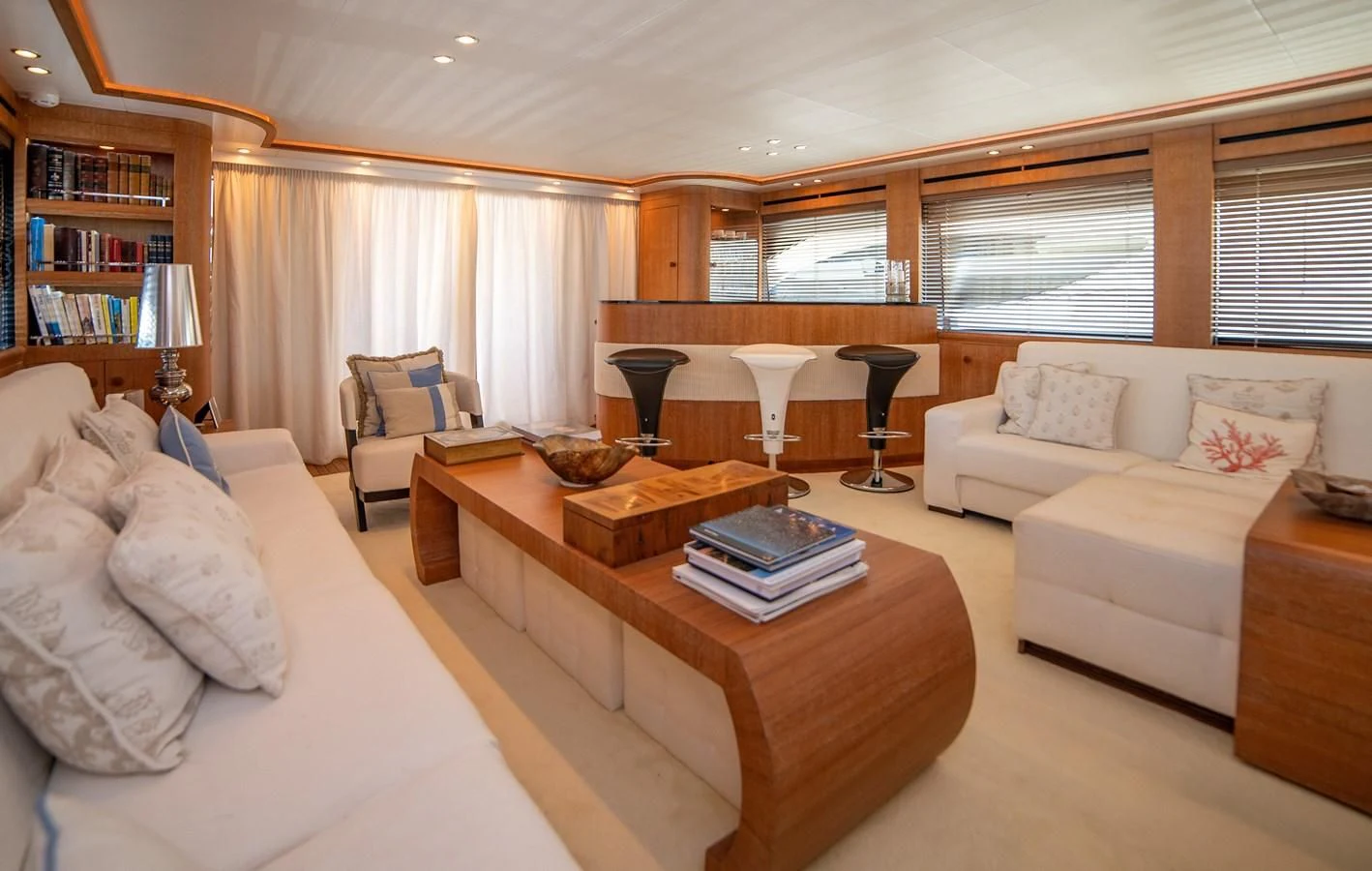 a living room with a couch and a coffee table aboard B TWO Yacht for Sale