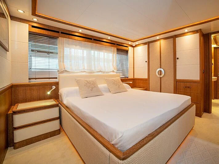 a bed in a room aboard B TWO Yacht for Sale