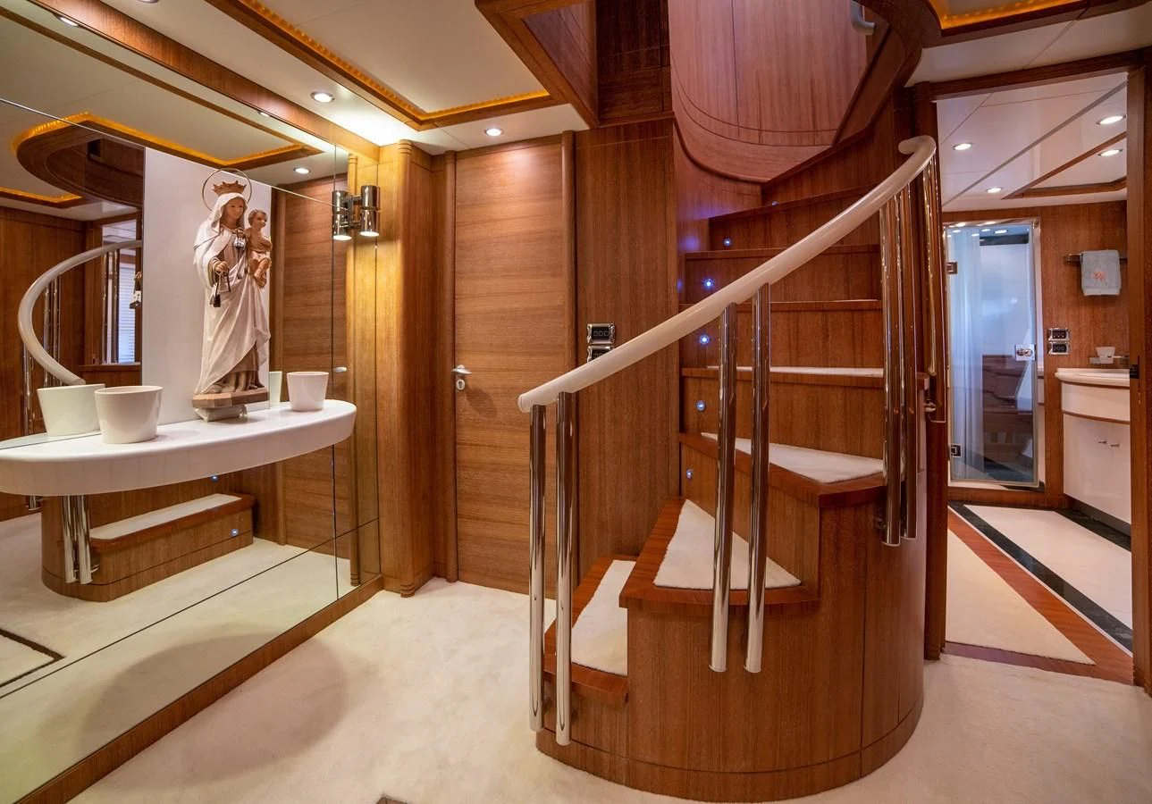 a bathroom with a wood staircase aboard B TWO Yacht for Sale
