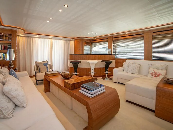 a living room with a couch and a coffee table aboard B TWO Yacht for Sale