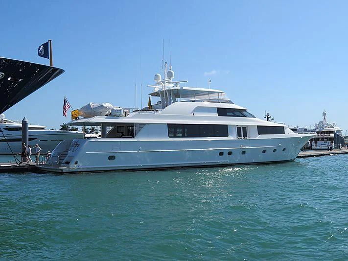a large white boat in the water aboard SLEEPOVER Yacht for Sale
