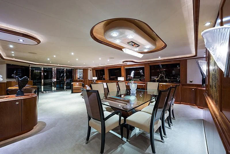 a room with a table and chairs aboard SLEEPOVER Yacht for Sale