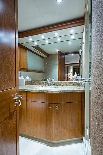 a bathroom with a large mirror aboard SLEEPOVER Yacht for Sale