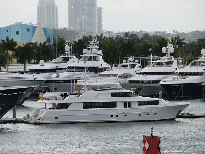 a group of boats are parked in a harbor aboard SLEEPOVER Yacht for Sale