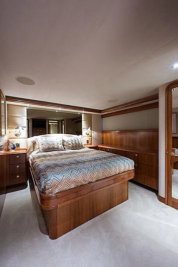 a bed in a room aboard SLEEPOVER Yacht for Sale