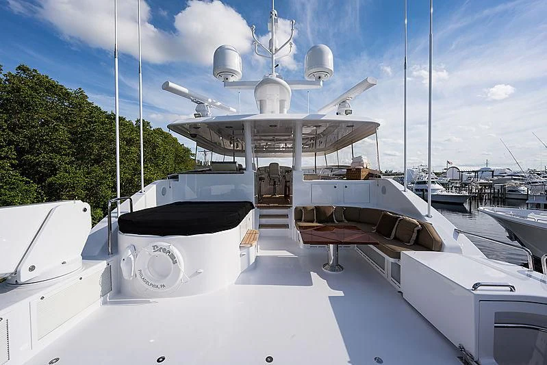 a boat docked at a pier aboard SLEEPOVER Yacht for Sale