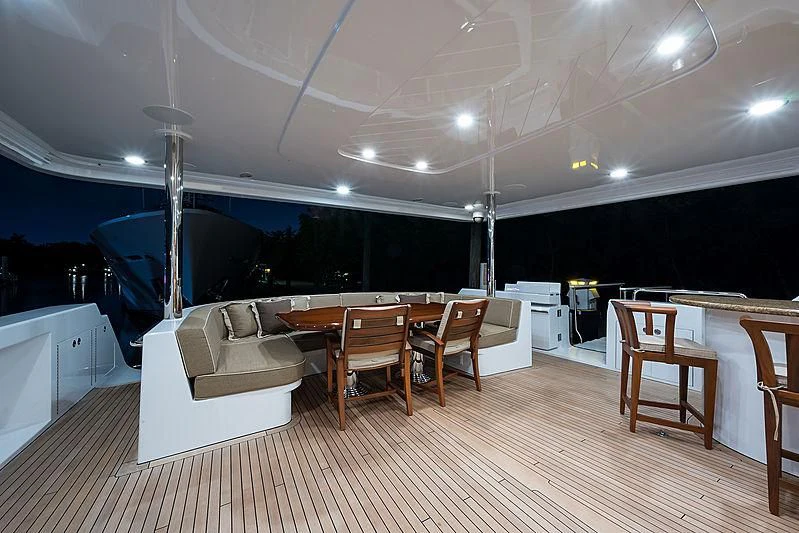 a room with a table and chairs aboard SLEEPOVER Yacht for Sale