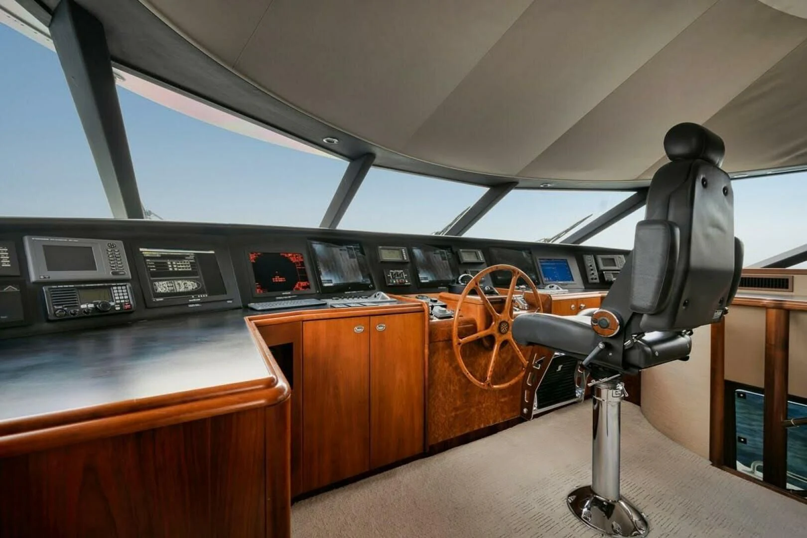 a room with a desk and chairs aboard SLEEPOVER Yacht for Sale