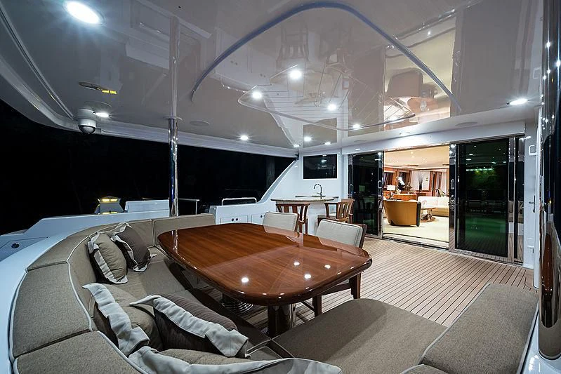 a large living room with a large glass ceiling aboard SLEEPOVER Yacht for Sale
