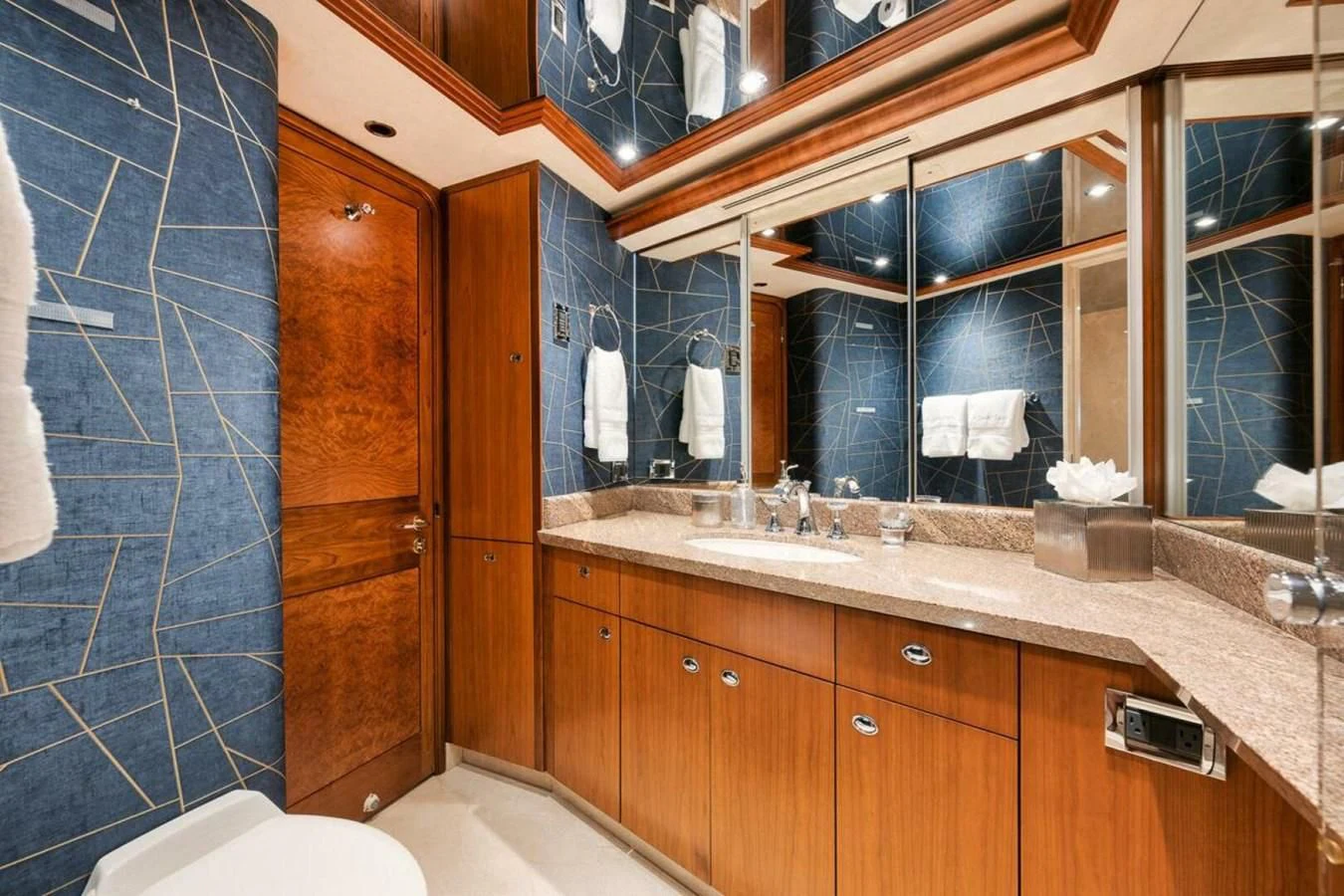 a bathroom with a large mirror aboard SLEEPOVER Yacht for Sale