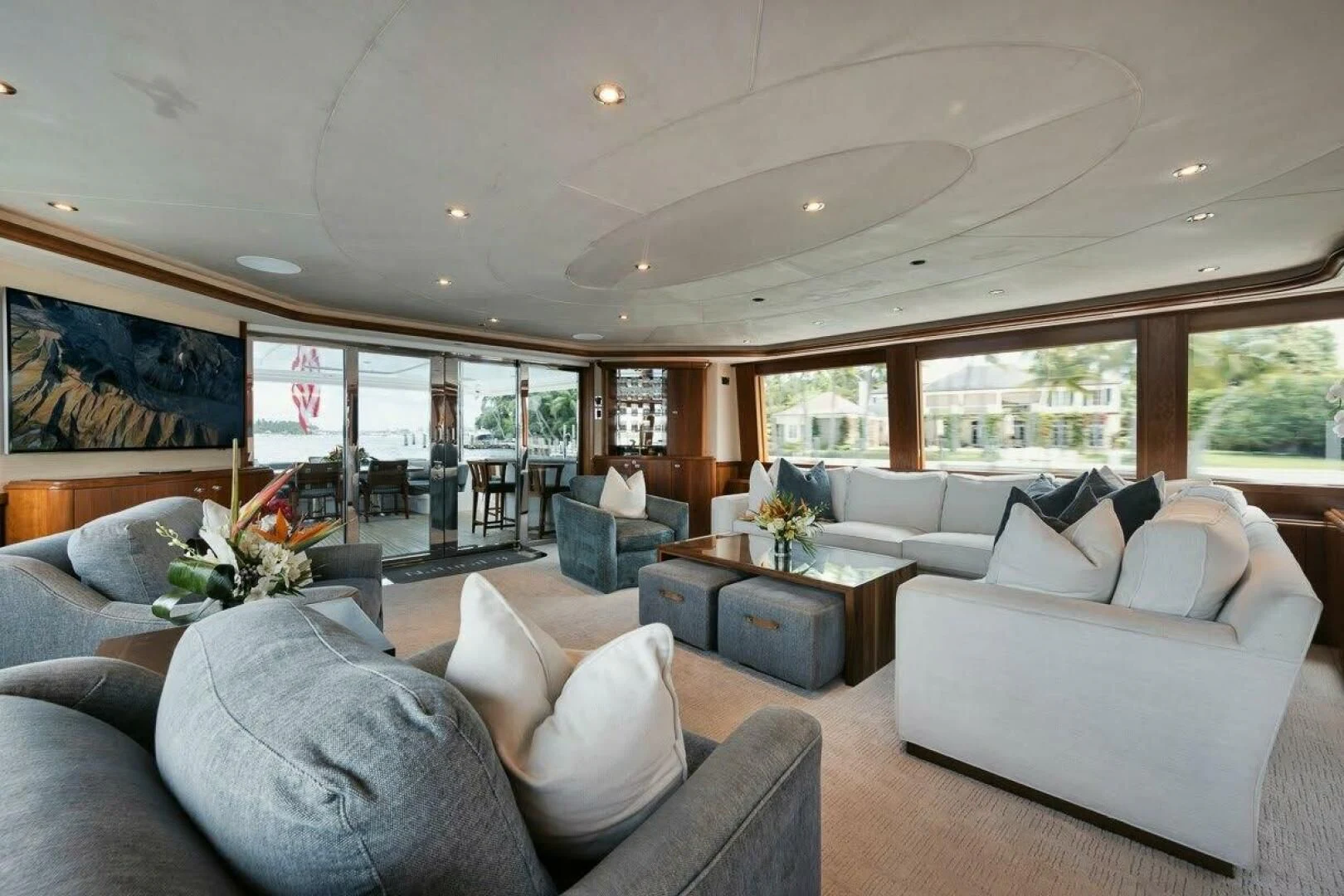 a living room with a large window aboard SLEEPOVER Yacht for Sale