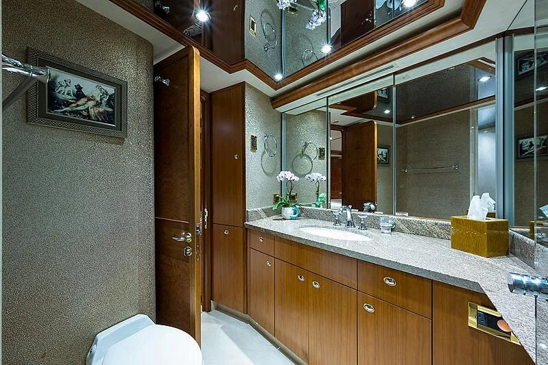 a bathroom with a large mirror aboard SLEEPOVER Yacht for Sale