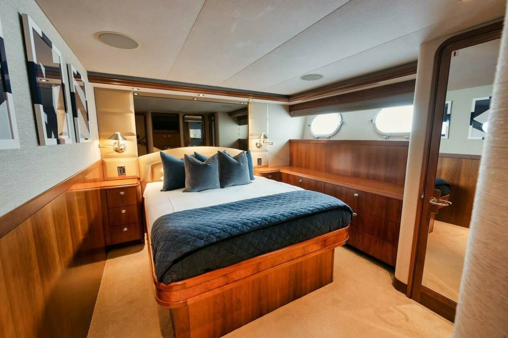 a bedroom with a bed aboard SLEEPOVER Yacht for Sale