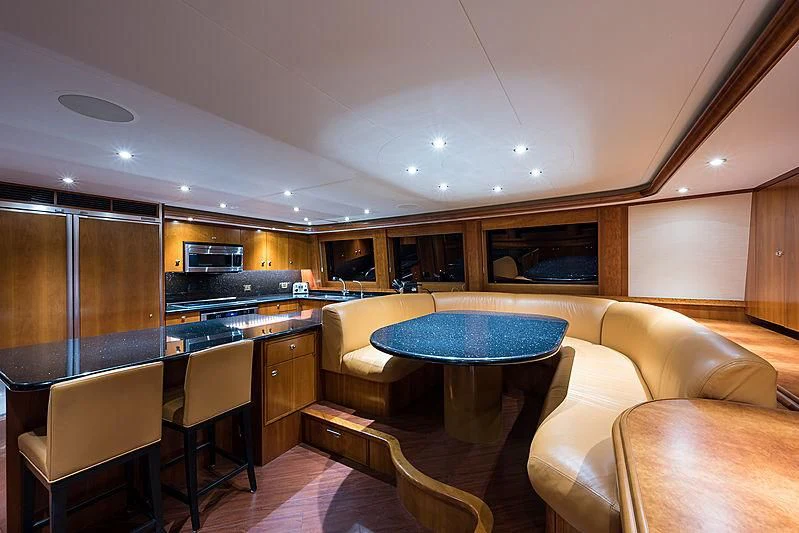 a kitchen and living room aboard SLEEPOVER Yacht for Sale