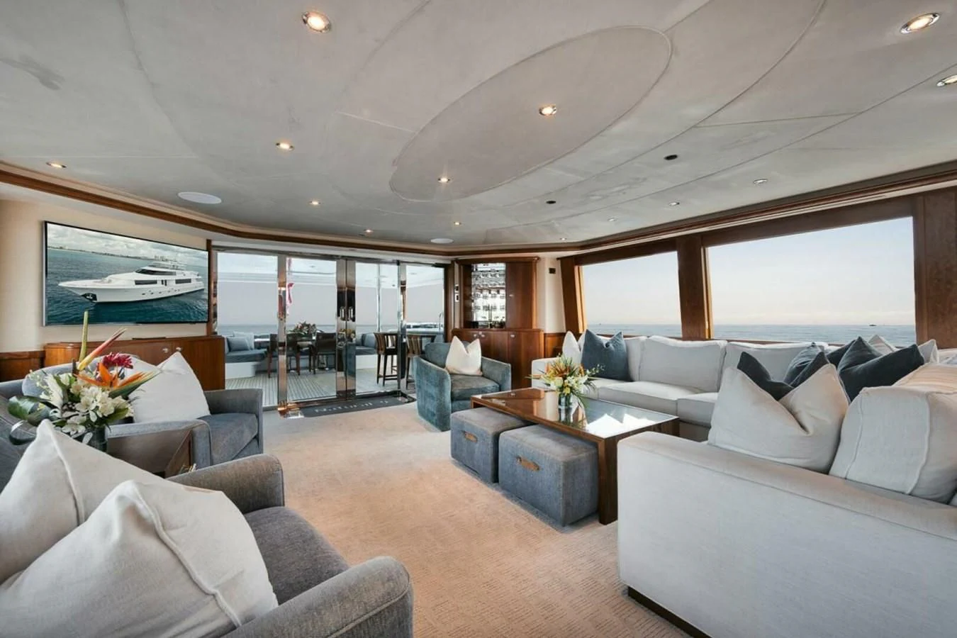 a living room with a large window aboard SLEEPOVER Yacht for Sale