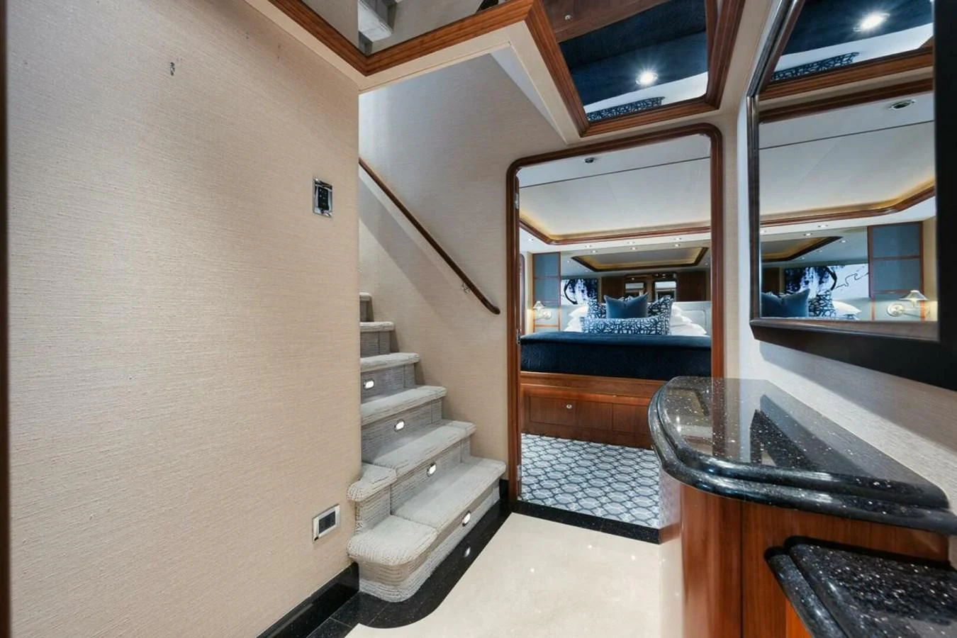 a room with a bunk bed and a desk aboard SLEEPOVER Yacht for Sale