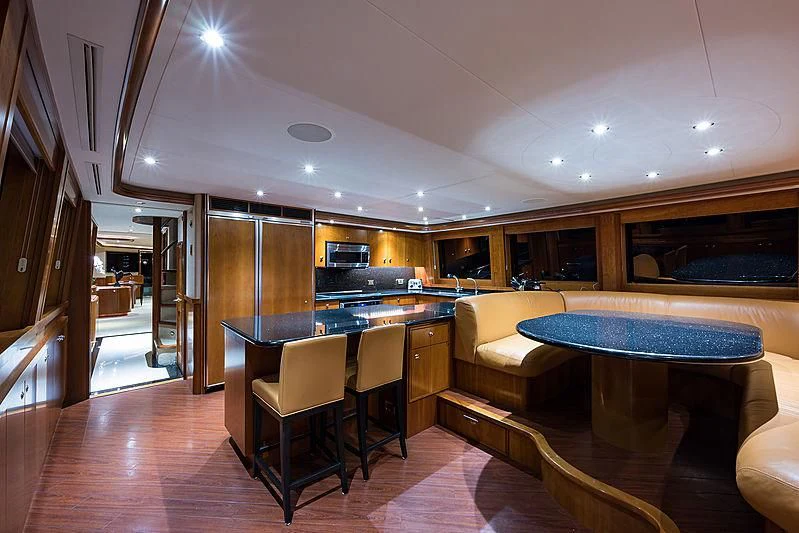 a kitchen and living room aboard SLEEPOVER Yacht for Sale