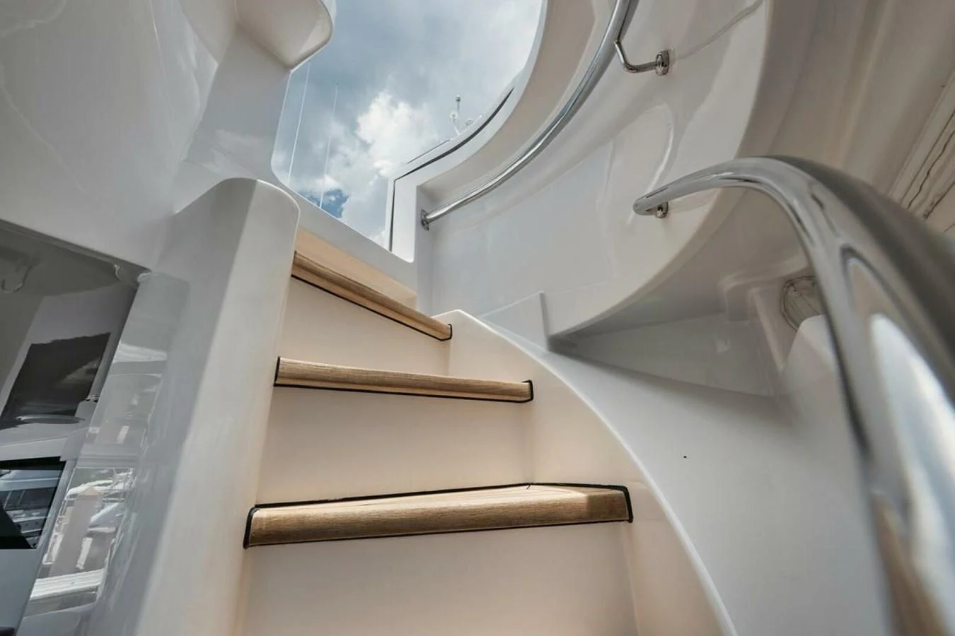 a white sink with a faucet aboard SLEEPOVER Yacht for Sale