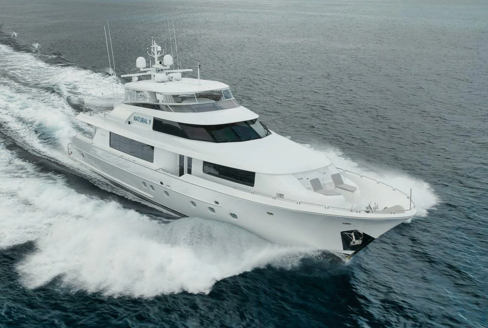 a white yacht on the water aboard SLEEPOVER Yacht for Sale