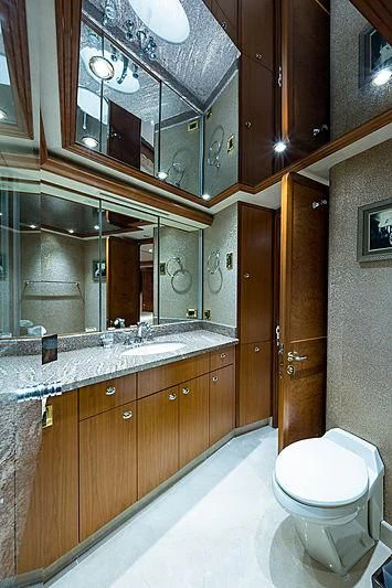 a bathroom with a large mirror aboard SLEEPOVER Yacht for Sale