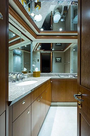 a bathroom with a large mirror aboard SLEEPOVER Yacht for Sale
