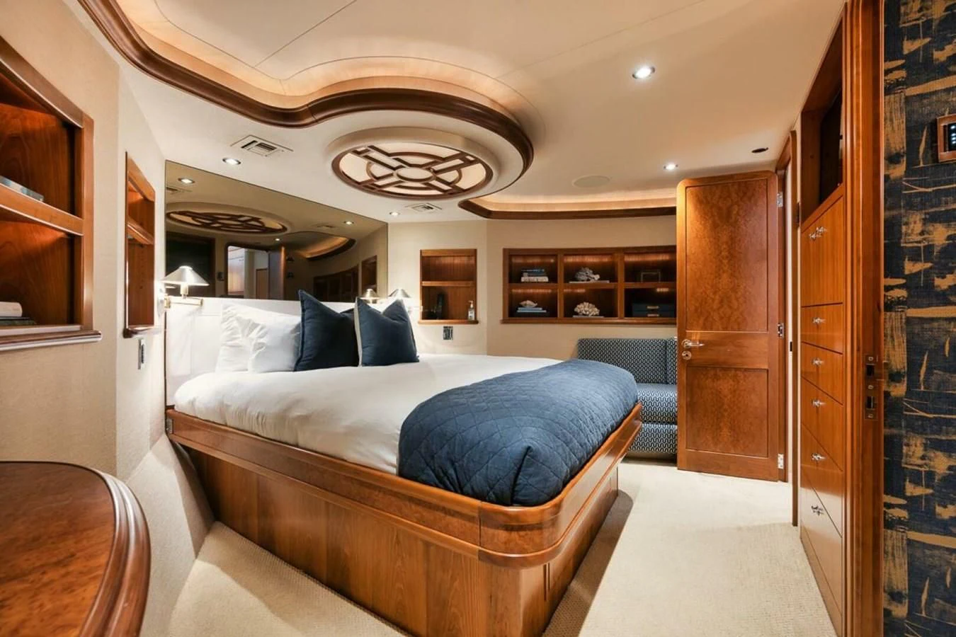 a bedroom with a bed aboard SLEEPOVER Yacht for Sale