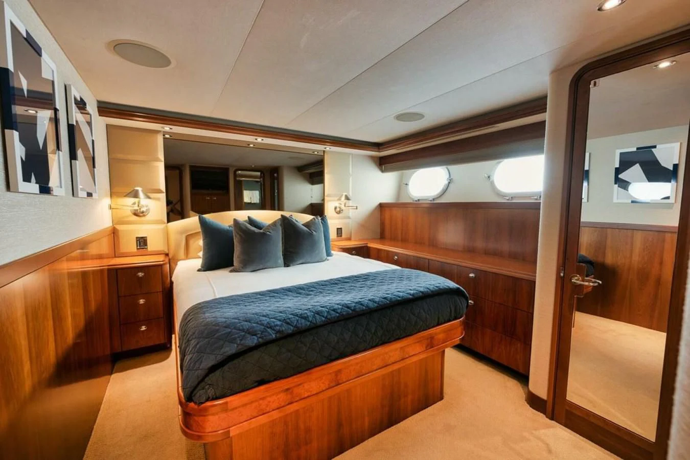 a bed in a room aboard SLEEPOVER Yacht for Sale