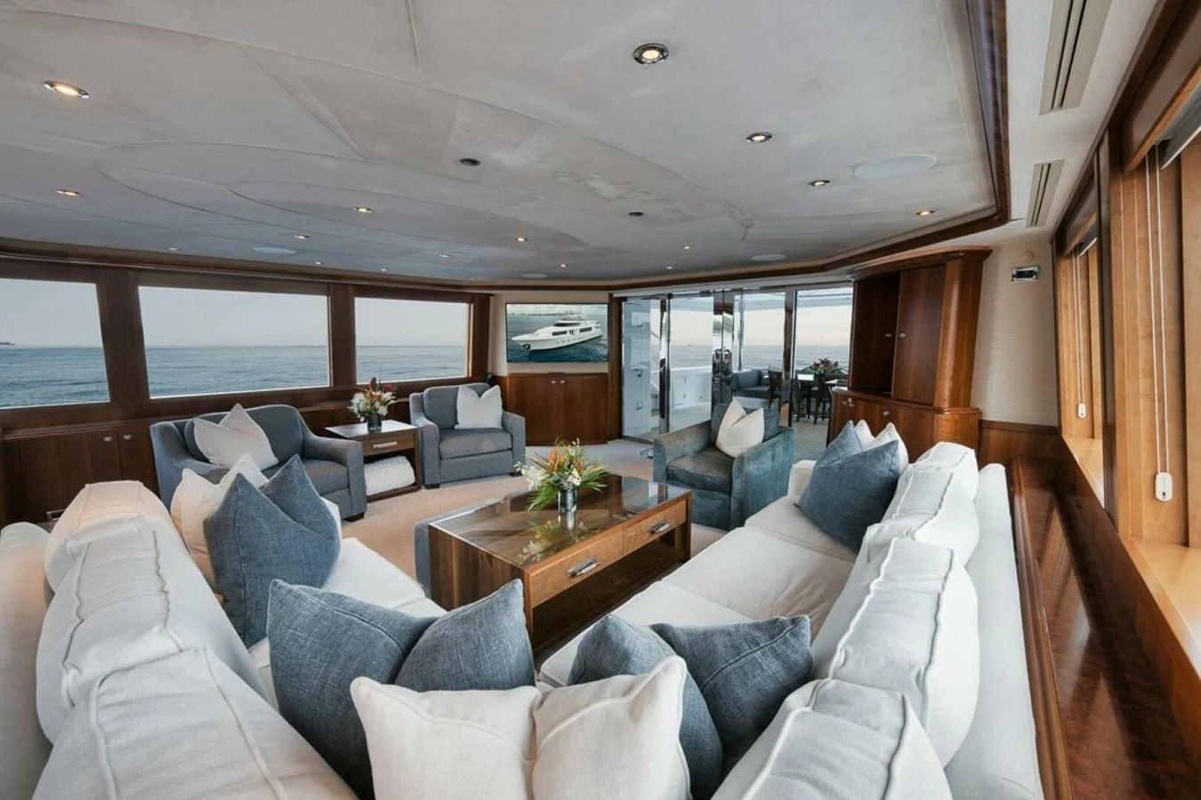 a living room with a large window aboard SLEEPOVER Yacht for Sale