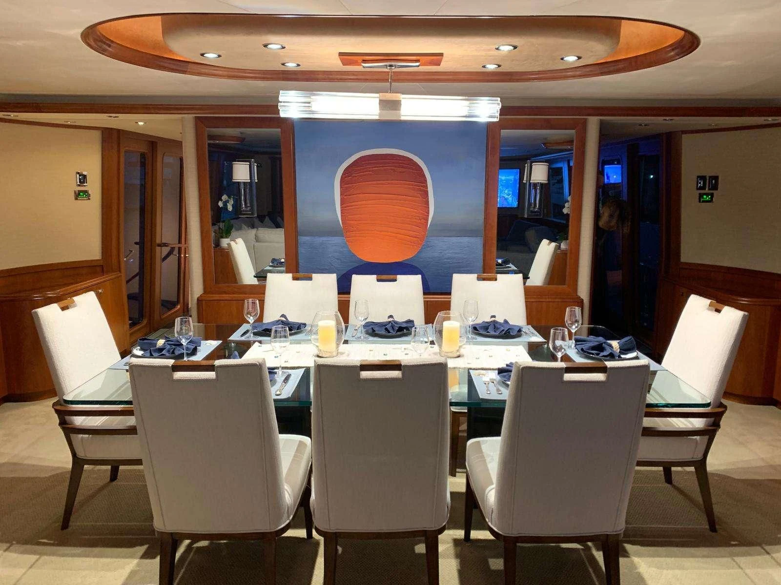 a conference room with tables and chairs aboard SLEEPOVER Yacht for Sale