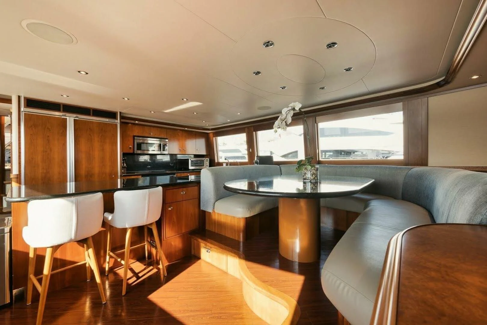 a kitchen and dining area aboard SLEEPOVER Yacht for Sale
