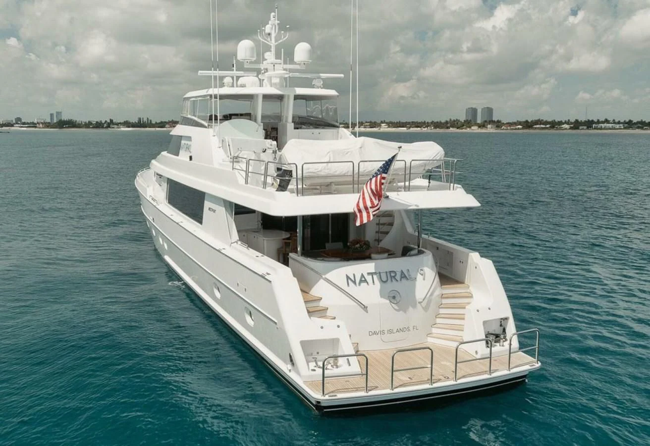 a large white boat in the water aboard SLEEPOVER Yacht for Sale