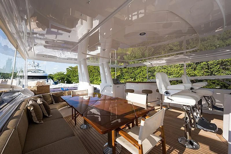 a room with a table and chairs aboard SLEEPOVER Yacht for Sale