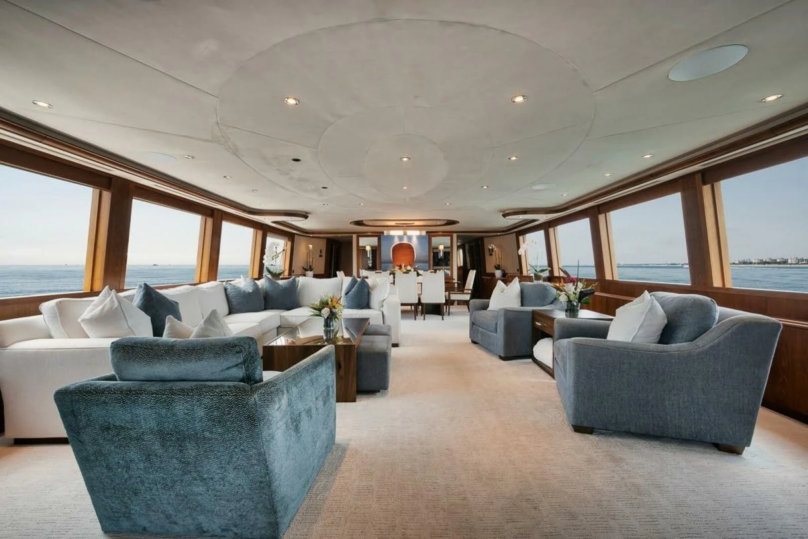 a living room with a large window aboard SLEEPOVER Yacht for Sale