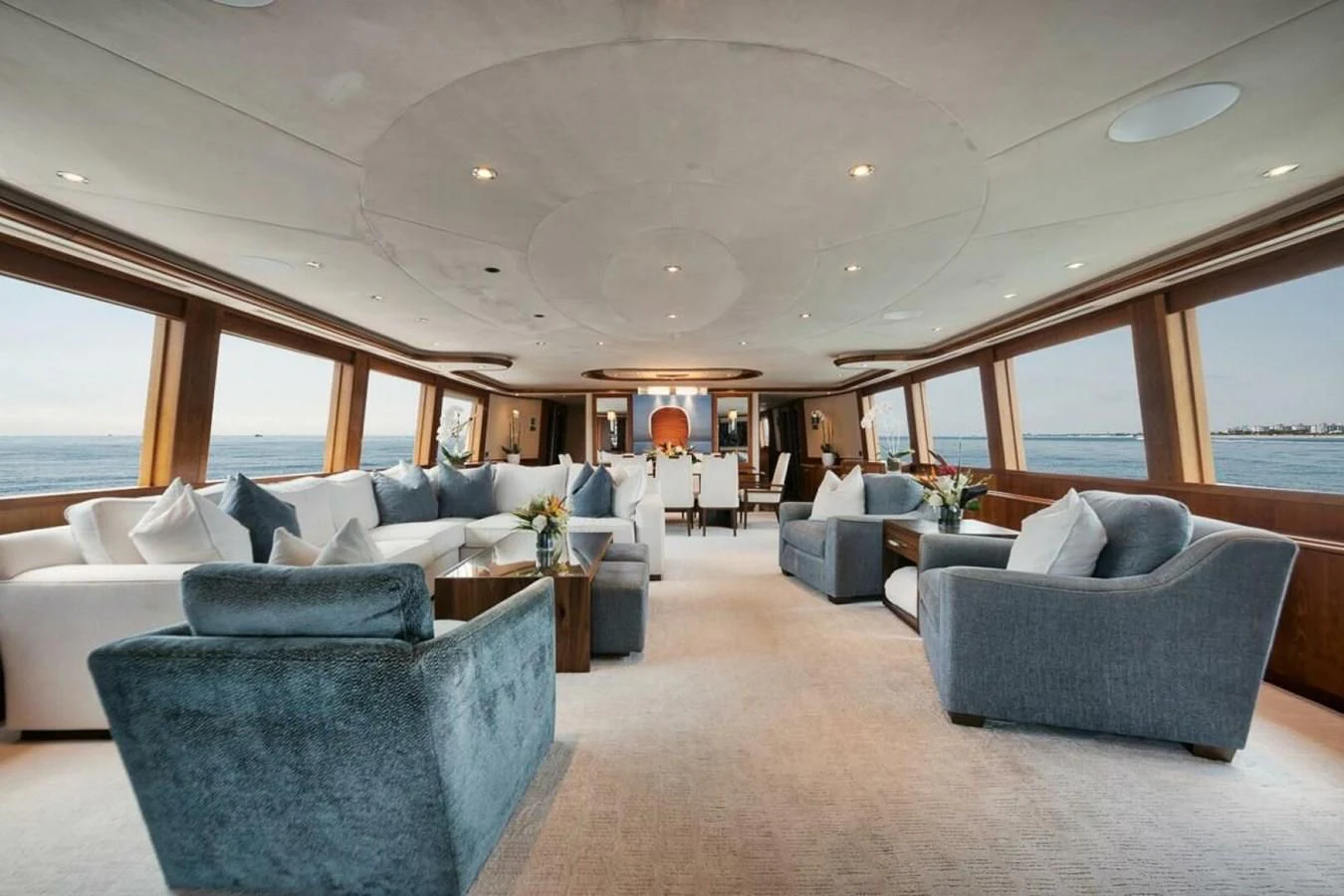 a living room with a large window aboard SLEEPOVER Yacht for Sale