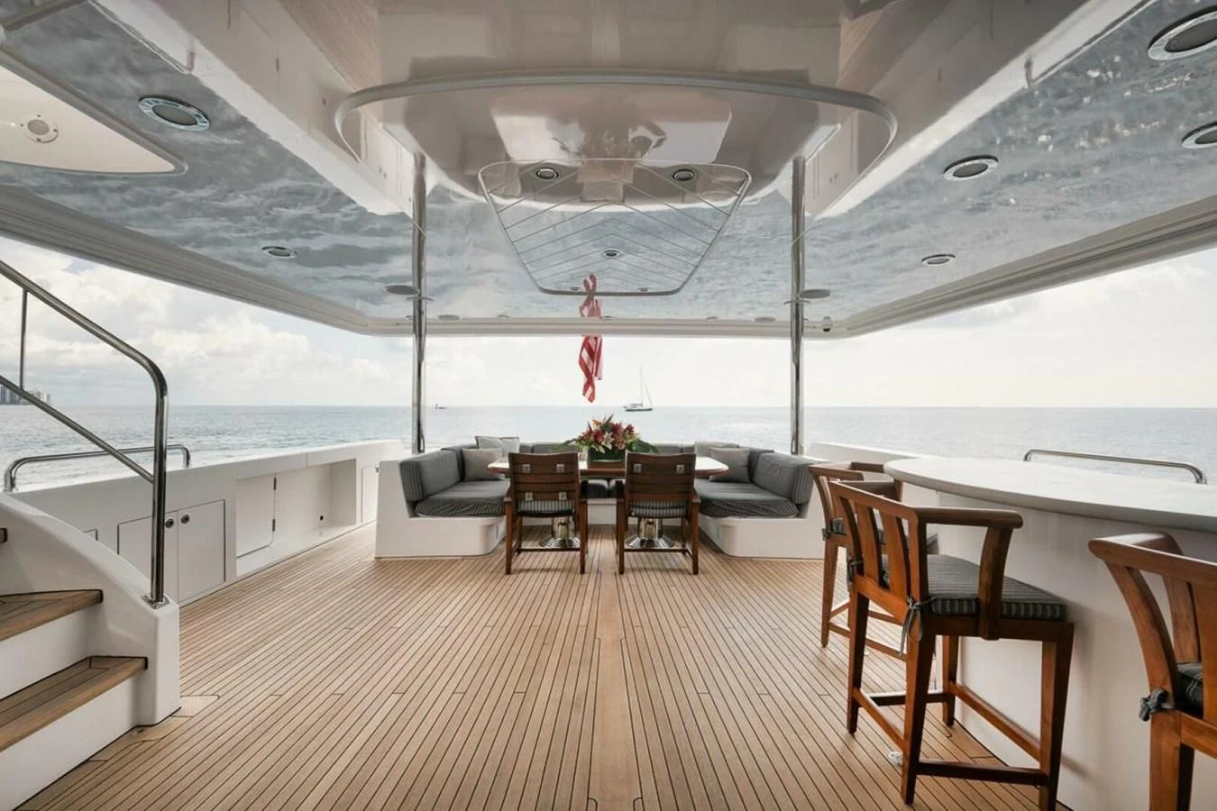 a room with a table and chairs aboard SLEEPOVER Yacht for Sale