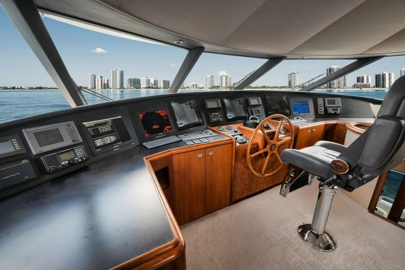 a room with a desk and chairs aboard SLEEPOVER Yacht for Sale