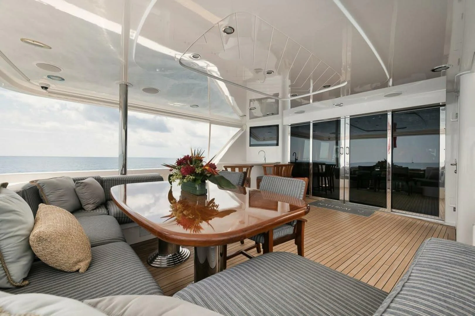 a room with a table and chairs aboard SLEEPOVER Yacht for Sale