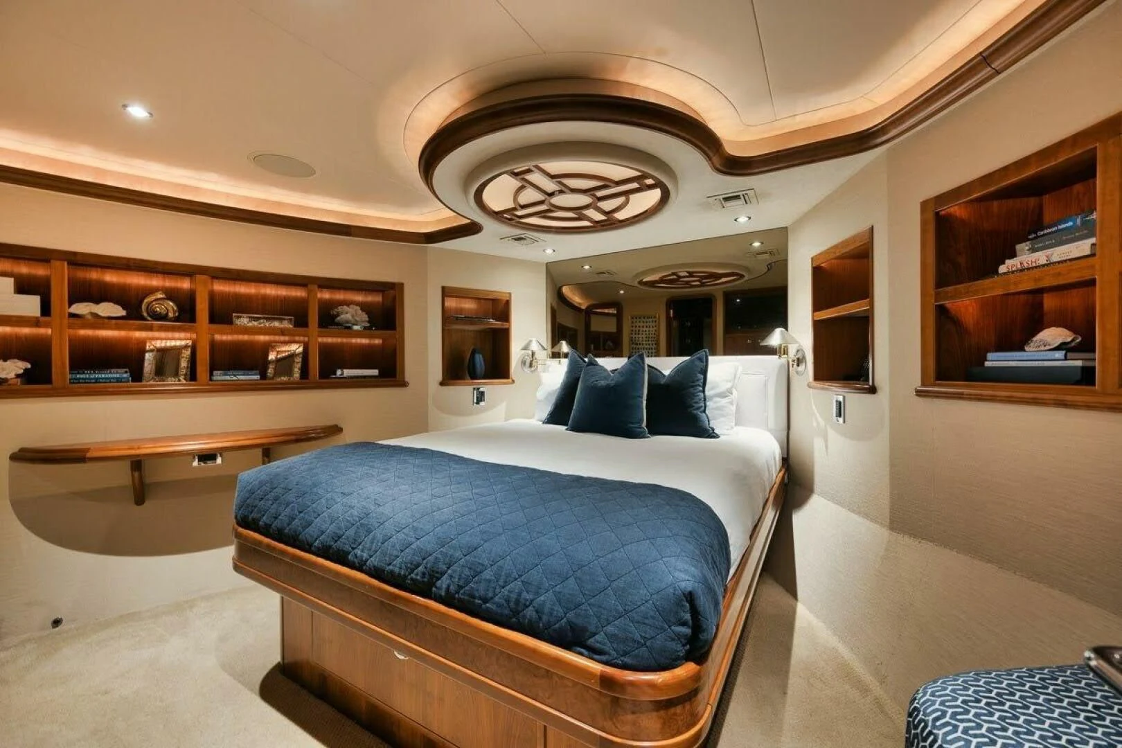 a bedroom with a bed aboard SLEEPOVER Yacht for Sale