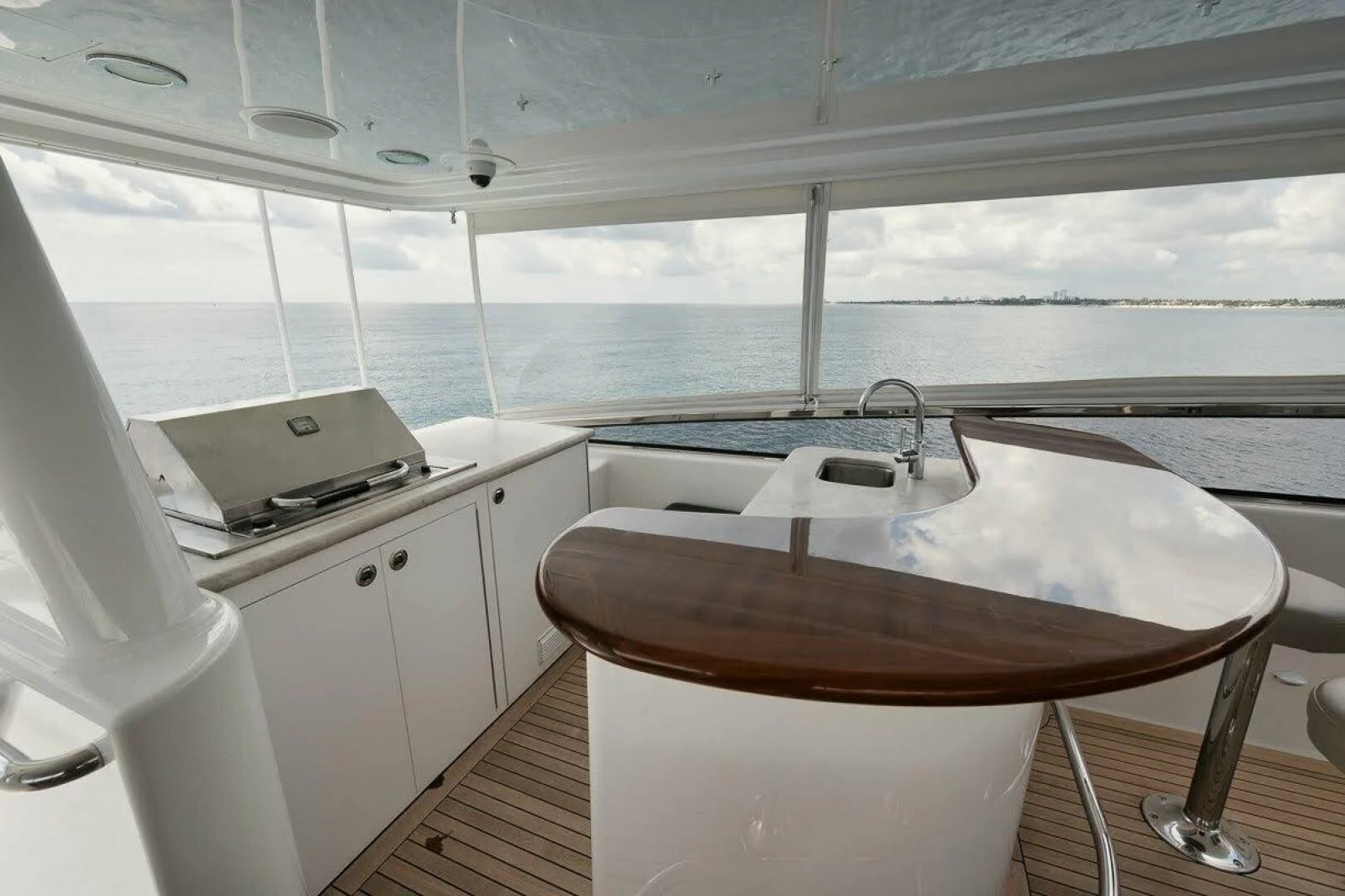a kitchen with a table and a sink aboard SLEEPOVER Yacht for Sale