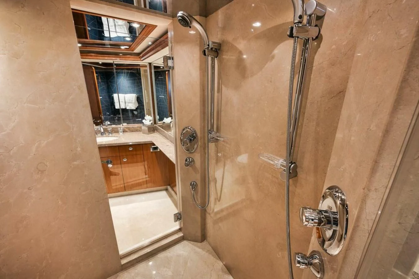a bathroom with a shower and a sink aboard SLEEPOVER Yacht for Sale