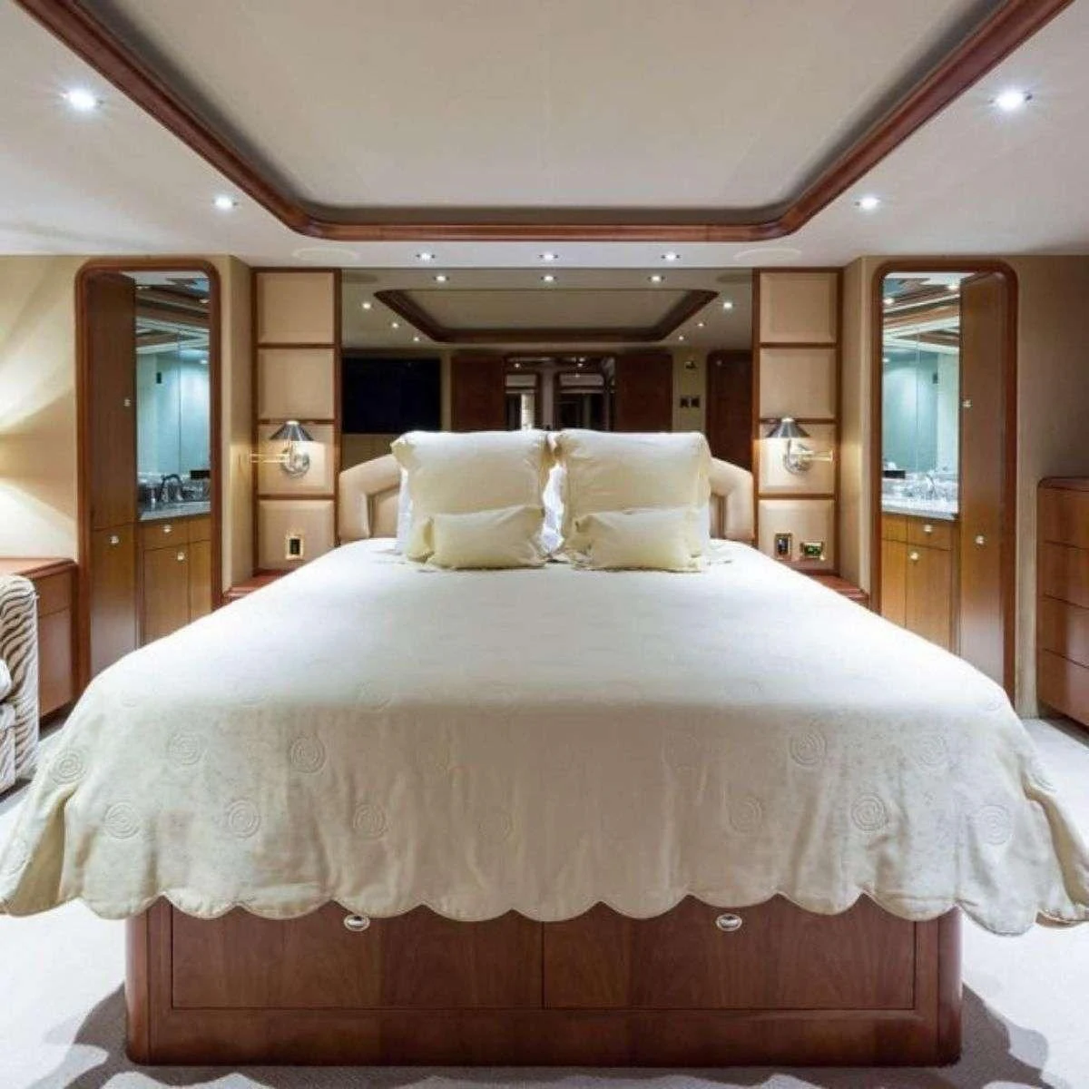 a bed with white sheets aboard SLEEPOVER Yacht for Sale