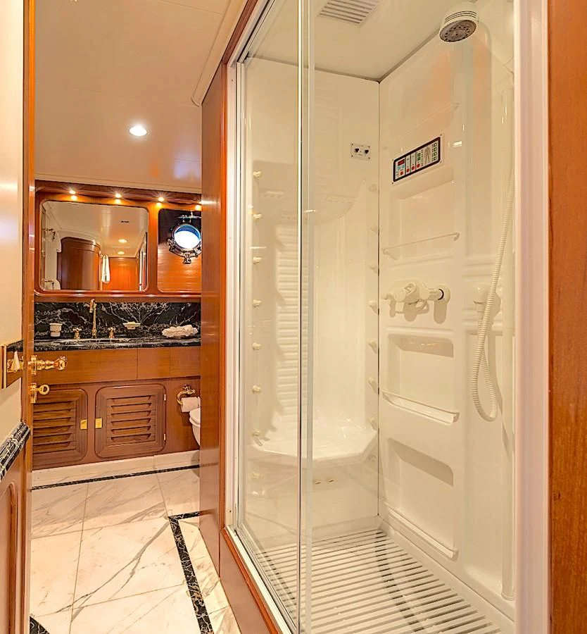 a shower unit in a bathroom aboard TAMARITA Yacht for Sale
