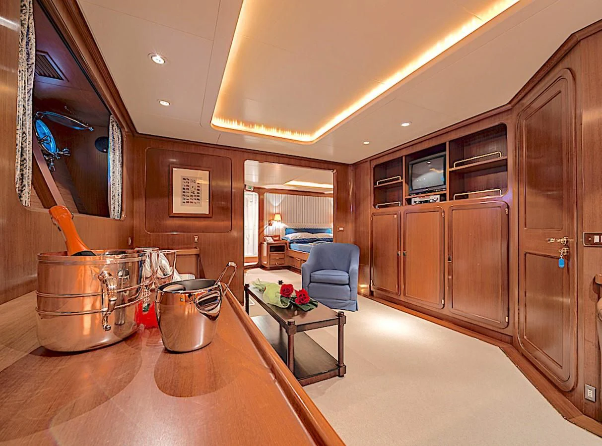 a kitchen with a large island aboard TAMARITA Yacht for Sale