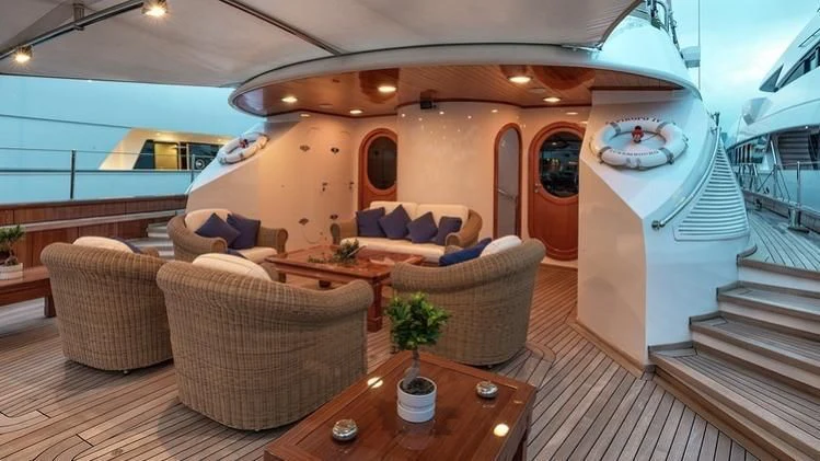 a large living room with a pool aboard TAMARITA Yacht for Sale