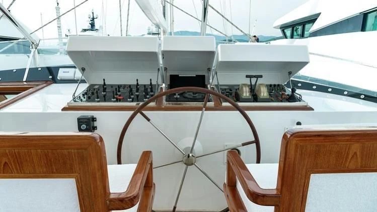 a boat with a machine on the water aboard TAMARITA Yacht for Sale