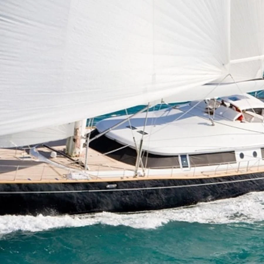 a boat docked at a pier aboard TAMARITA Yacht for Sale