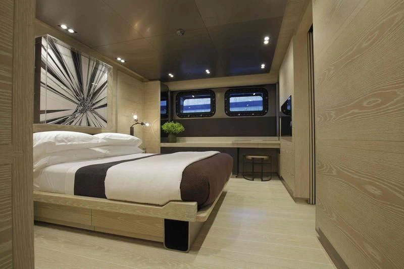 a room with a bed and a tv aboard BADIS I Yacht for Sale