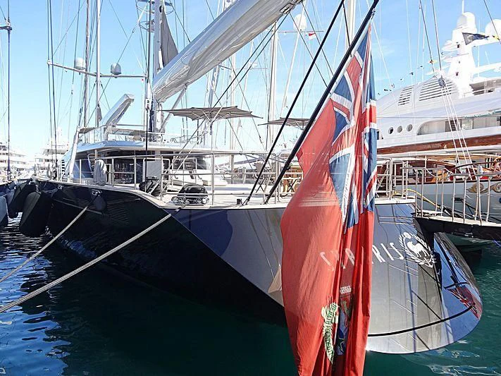 a sailboat with a red and white sail aboard BADIS I Yacht for Sale