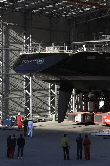 a group of people in a warehouse aboard BADIS I Yacht for Sale