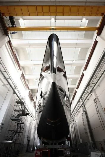 a black snowboard from a ceiling aboard BADIS I Yacht for Sale